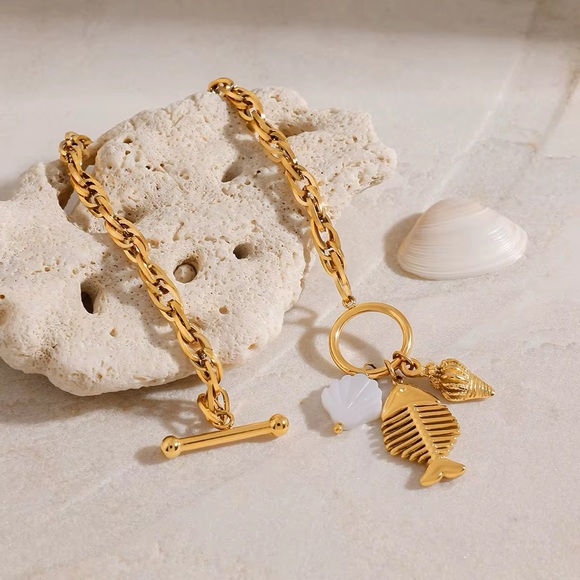 Jewelry - Gold Charm Bracelet with Shell and Fish Pendants